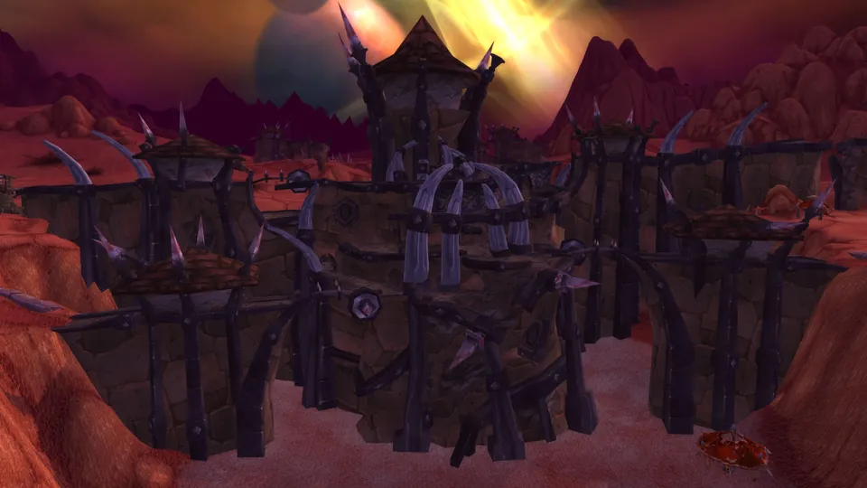 The spiked outer walls of Hellfire Citadel under Outland's sky