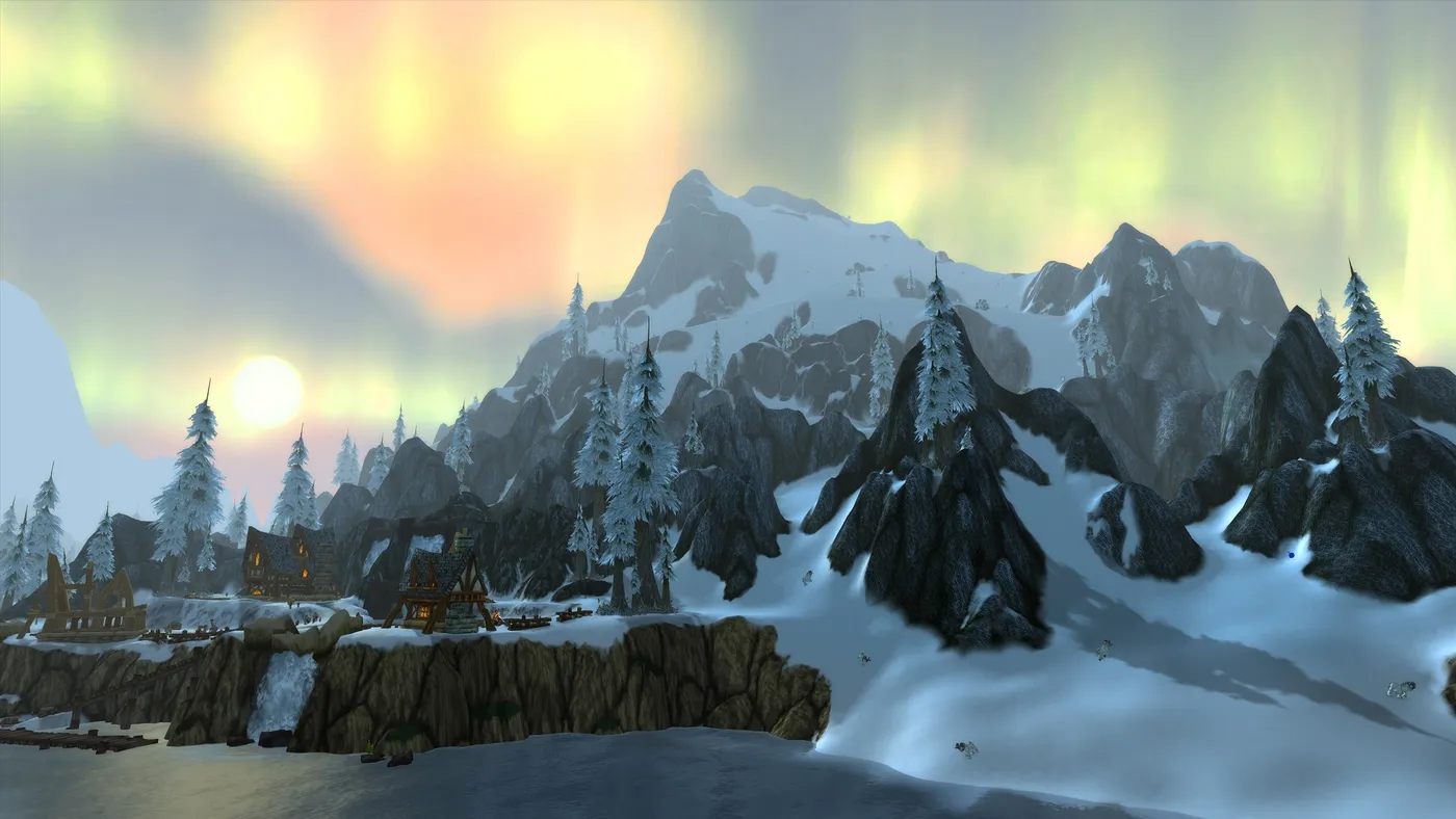 Snowy peaks above a settlement on Northrend's coast, from Blizzard's Borean Tundra and Howling Fjord guide
